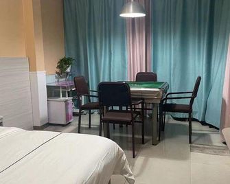 Xinlong Hotel - צ'נגשה - חדר שינה