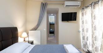 A&J Apartments or Rooms athens airport - Markopoulo Mesogaias - Habitación