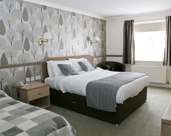 ميلفيلدز هوتل - غريمسبي - غرفة نوم