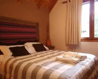 Hostería Bajo Cero - Villa La Angostura - Schlafzimmer