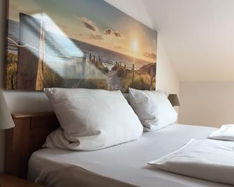 Gästehaus am Wasserpark - רוסט - חדר שינה