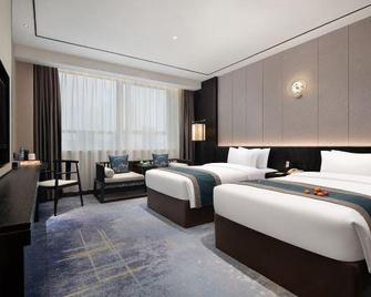 Full Hotel - Zhuzhou - Bedroom