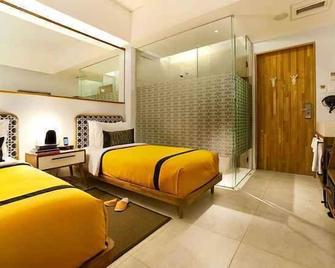 Kosenda Hotel - Giacarta - Camera da letto