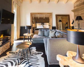 House of Hütter - Wachtelhof Hotel & Spa - Maria Alm am Steinernen Meer - Sala de estar