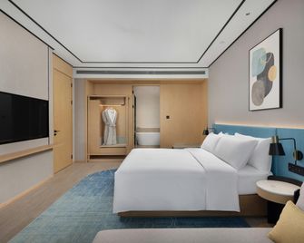 Hilton Garden Inn Rizhao High-Tech Zone - Rizhao - Slaapkamer