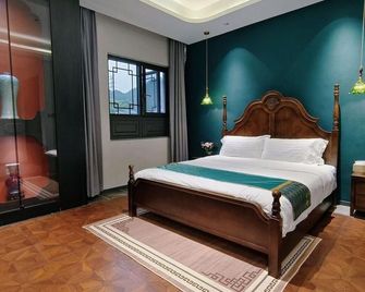 Jingdezhen Sanbao Hefu Homestay - Jingdezhen - Bedroom