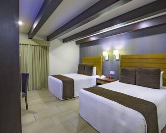 Hotel La Pinta - Ensenada - Schlafzimmer