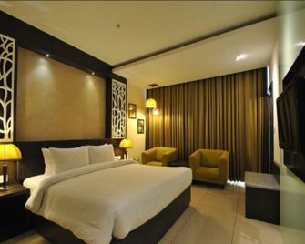 Rivatas Hotel By Ideal - ורנאסי - חדר שינה