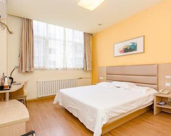 Grace Inn Dezhou Central Square - Dezhou - Спальня