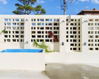 Nonsmoking standard twin room without meals A l / Shimajiri-gun Okinawa - Kumejima - Будівля