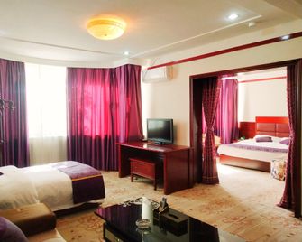 Jinta Hotel - Jiuquan - Slaapkamer