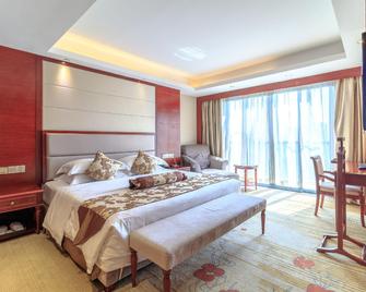 Huijin Holiday Hotel - Quanzhou - Bedroom