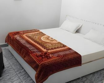 Hotel O Highway Destiny - Morādābād - Schlafzimmer