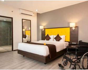 망고 호텔 아이롤리 - 나비 뭄바이 - 침실