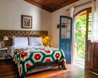 بوزادا أركاديا مينيرا - أورو بريتو - غرفة نوم