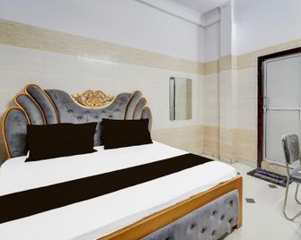 Hotel O Garv - Lakhīmpur - Bedroom