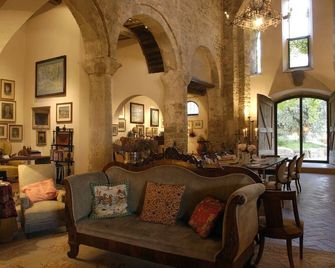 Vacation in an apartment inside a historic organic farm with swimming pool - Roccastrada - Lounge