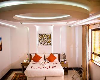 ميليلي هوتل - نايروبي - غرفة نوم