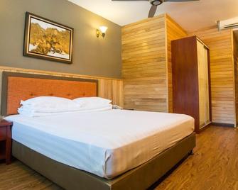1st Place Hotel - Decatur - Schlafzimmer