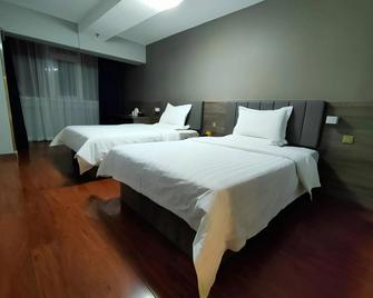 7 Days Inn Tianjin Sports Institute North Avenue - Tianjin - Bedroom