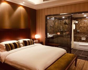 Nanjing Southeast University Liuyuan Hotel (Xuanwu Lake Branch) - نانجينغ - غرفة نوم