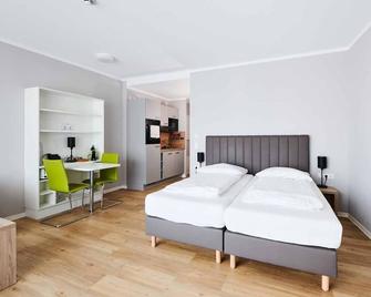 Apartments M - Adapt Apartments Wetzlar - Wetzlar - Bedroom