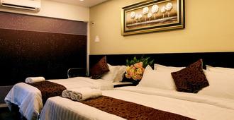 J Suites Hotel - Kuala Terengganu - Phòng ngủ
