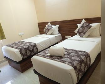 Bulande Hospitality Manyata Tech Park Hebbal - เบงกาลูรู - ห้องนอน