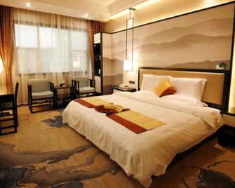 Yutai International Hotel - Shangrao - Schlafzimmer