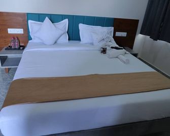 Hotel Lord Krishna - Dwārka - Спальня