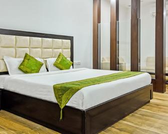 Treebo Red Petal Jalandhar - Jalandhar - Bedroom