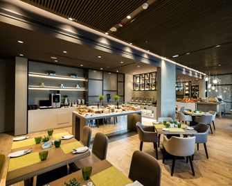 Centro Mada Amman by Rotana - 安曼 - 餐廳