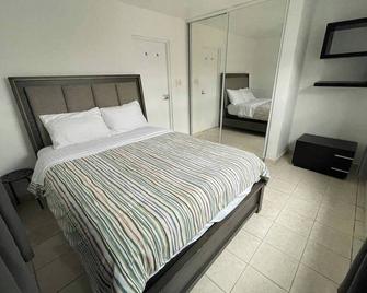 Cozy Gem close to Airport - Carolina - Schlafzimmer