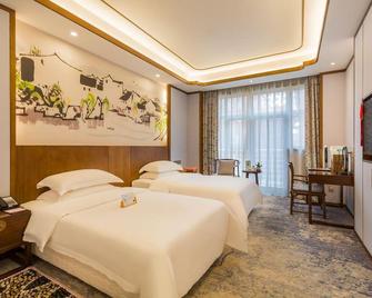 Huazhong Holiday Hotel - Baoding - Habitación