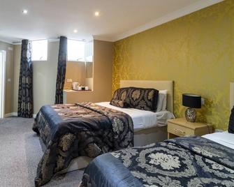 Stuart Hotel - לאטון - חדר שינה