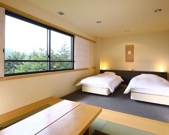 Manza Onsen Nisshinkan - Tsumagoi - Schlafzimmer