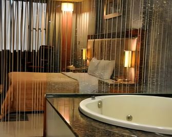 Beverly Garden Motel - Chiayi - Schlafzimmer