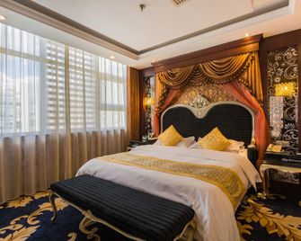 Shi Mao Garden Hotel - Peking - Schlafzimmer
