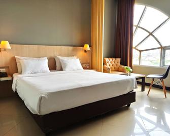 Rio City Hotel - Palembang - Bedroom