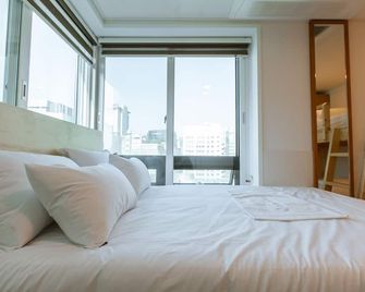 Step Inn Myeongdong 1 - סיאול - חדר שינה