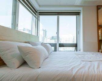 Step Inn Myeongdong 1 - סיאול - חדר שינה