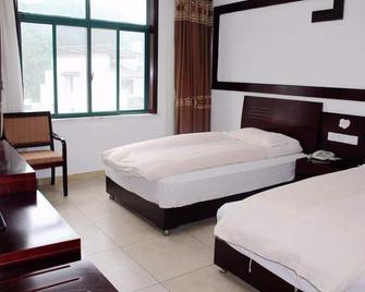 Xigu Resort Huangshan - Huangshan - Slaapkamer