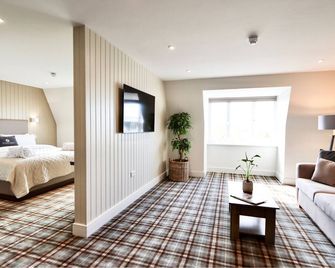 آول سانتس ريزورت - بوري سانت ادموندز - غرفة معيشة