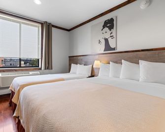 Lic Hotel - קווינס - חדר שינה