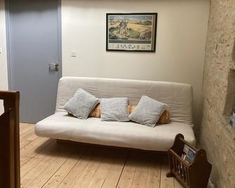 Maison spacieuse avec piscine chauffée, jardin clos et équipements de loisirs en pleine campagne - FR-1-306-1114 - Pannecé - Sala de estar