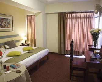 Kamana Hotel - Lima - Schlafzimmer