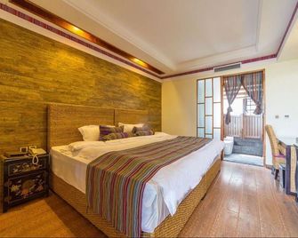 Langyue Hanfu Travel Theme Inn (Lijiang Ancient City Branch) - Lijiang - Camera da letto