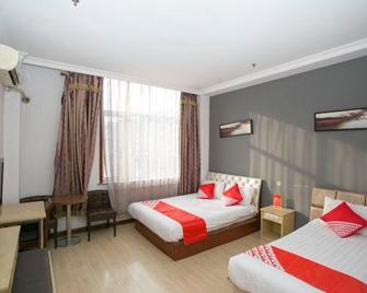 Dalian Jiating Business Hotel - Dalian - Bedroom