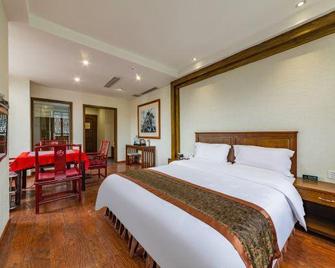 Shumen Inn Jiange Jianmenguan Hotel - Guangyuan - Bedroom