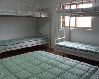 Dongdaemun Guesthouse - סיאול - חדר שינה